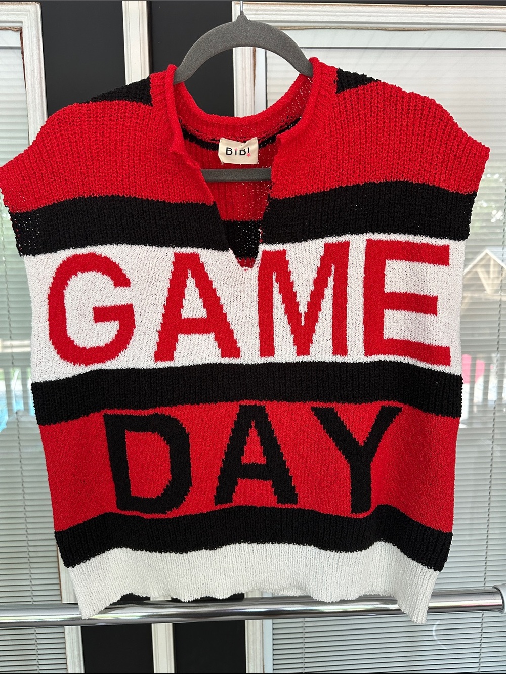 Size M BiBi Red Black White GAME DAY Knit Vest. PTP of 19 inches. NWOT!